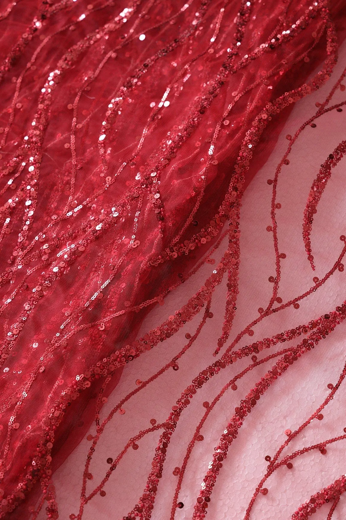 Beautiful Sequins With Red Thread Wavy Embroidery Work On Red Soft Net Fabric