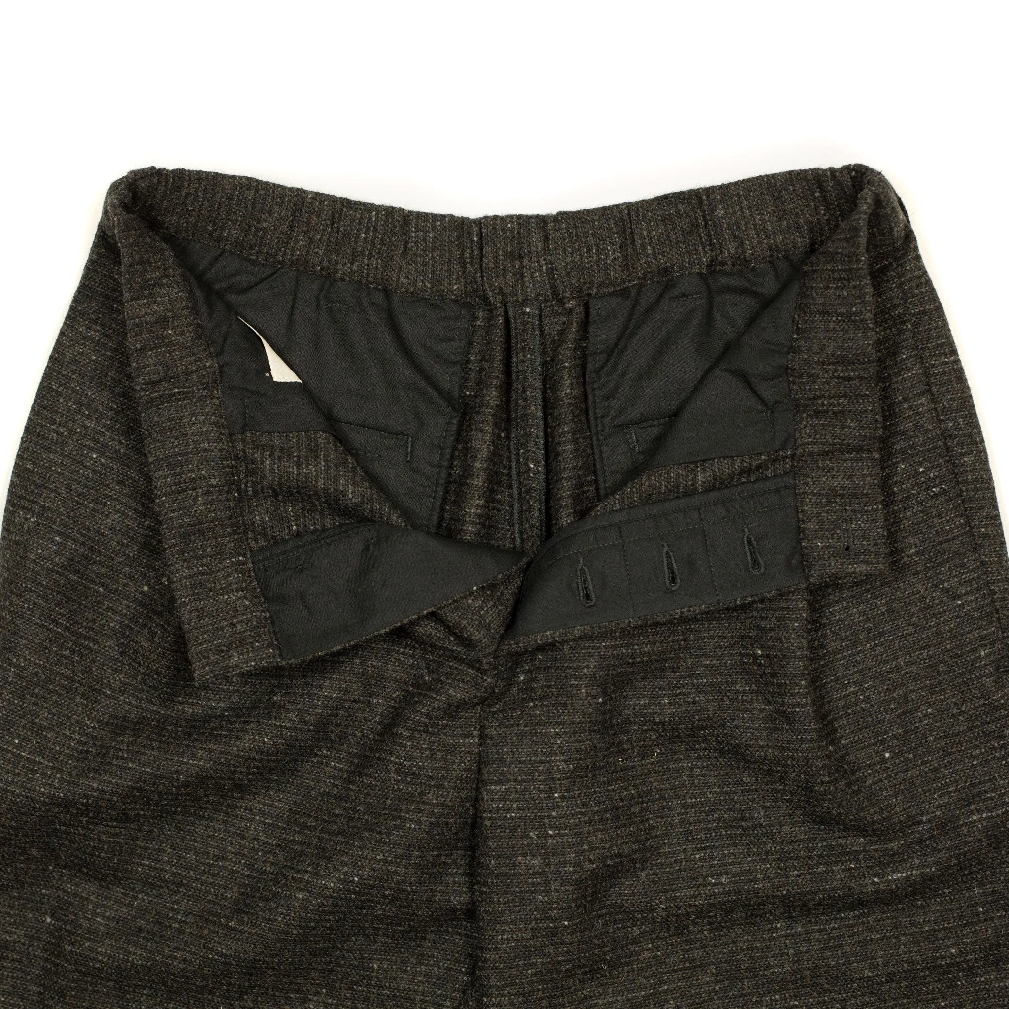 Combing easy pants in charcoal, brown and black Donegal grid wool