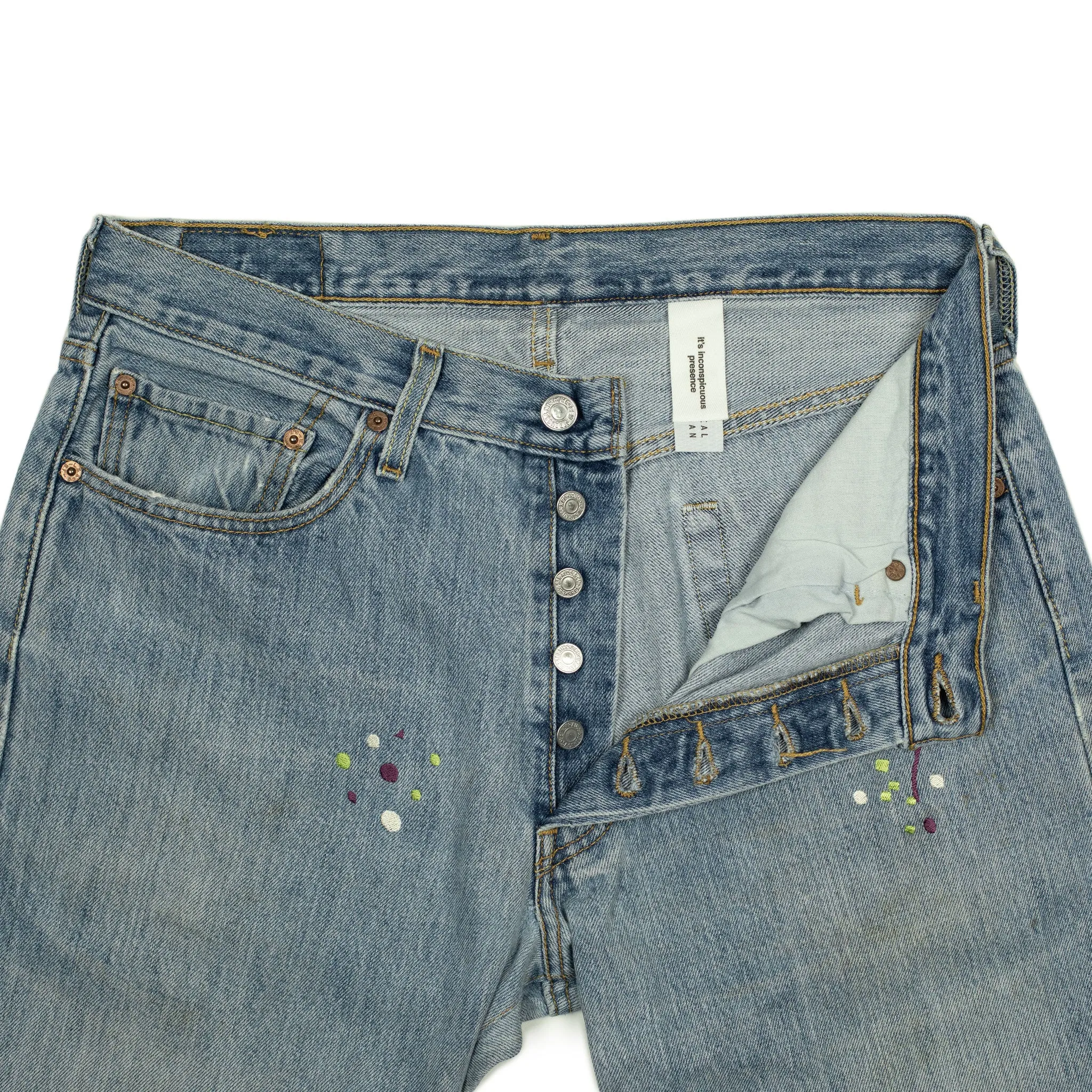 Vintage Levis 501 jeans with embroidered paint splatter, light wash